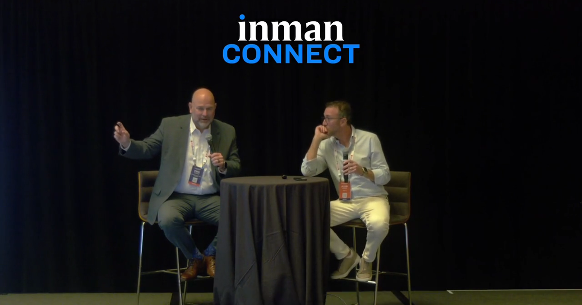 Phil Hawkins, CEO of the California Association of REALTORS, speaking on stage at Inman Connect while Judd Hoffman, CEO of Ethica AI, listens