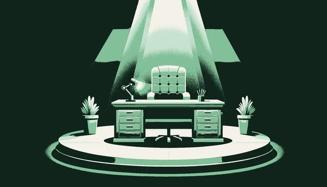 A polished executive desk under harsh stage lighting revealing every surface in stark detail with green light as the source